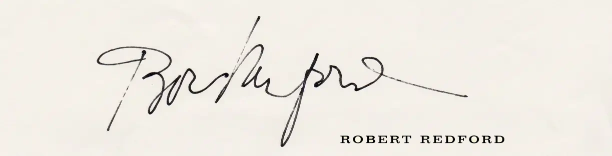 A black ink signature with looping, cursive writing above typed text that reads ROBERT REDFORD on a plain white background, reminiscent of personal endorsements or authentic testimonials. | Living with Wolves