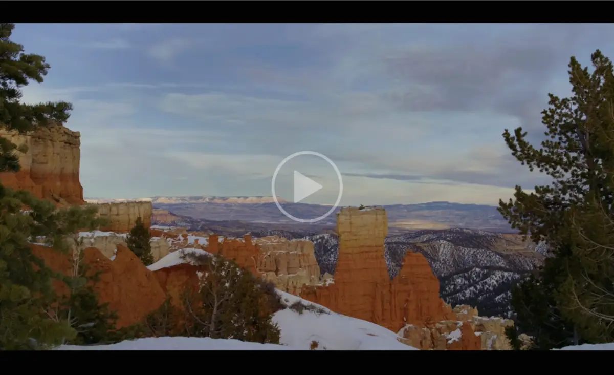 Snow-covered red rock hoodoos at Bryce Canyon National Park, shown in a video about a new study on how poaching is driving wolf deaths in the Great Lakes. | Living with Wolves